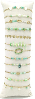 Stainless steel armbandjes op kussen groen - KOOS • alles voor de kapper - KOOS - Haarmode