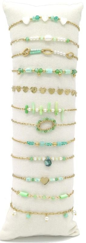 Stainless steel armbandjes op kussen groen - KOOS • alles voor de kapper - KOOS - Haarmode